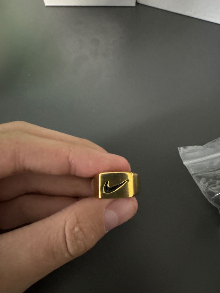 Gold Ring With Nike Logo image 1