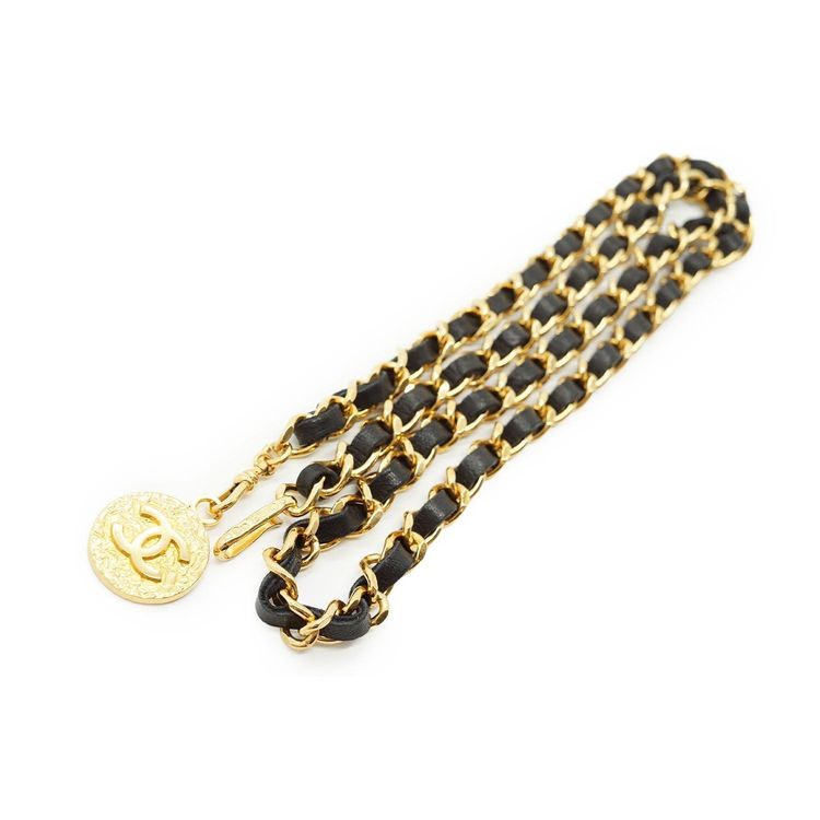 Cintura a catena Chanel vintage in metallo dorato con medaglione CC nero 1982