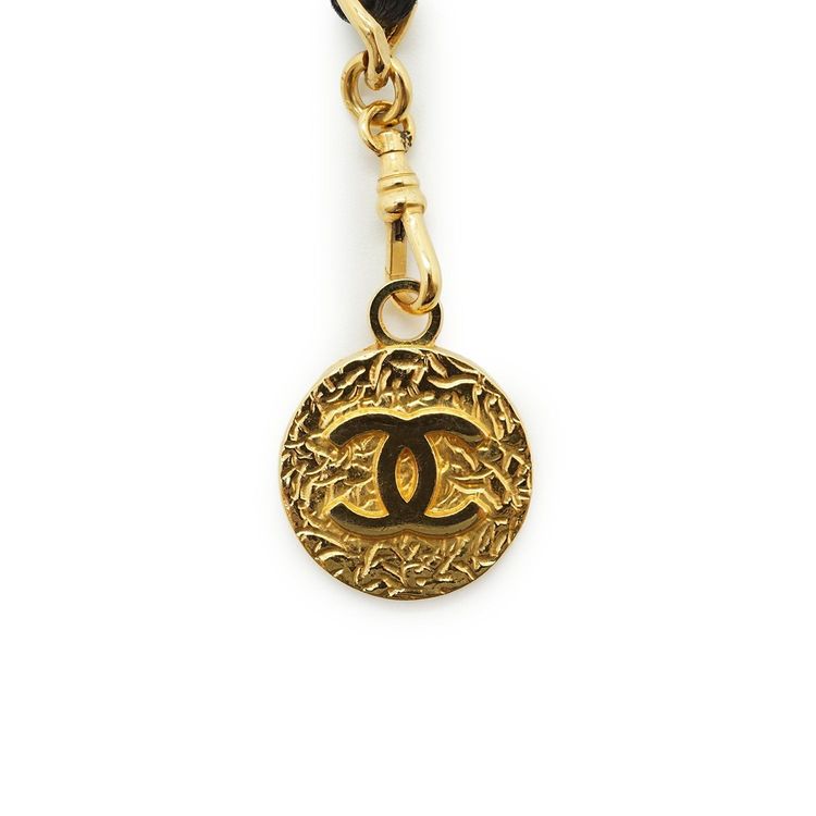 Cintura a catena Chanel vintage in metallo dorato con medaglione CC nero 1982 2