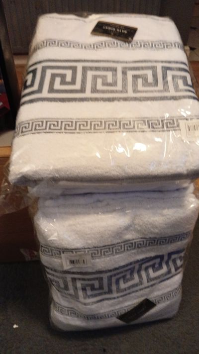 White Towels With Black Geometric Border