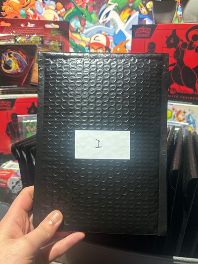 MYSTERY BAG(EVOLVING SKIES + PRISMATIC ETB + PRISMATIC BINDER COLLECTION)