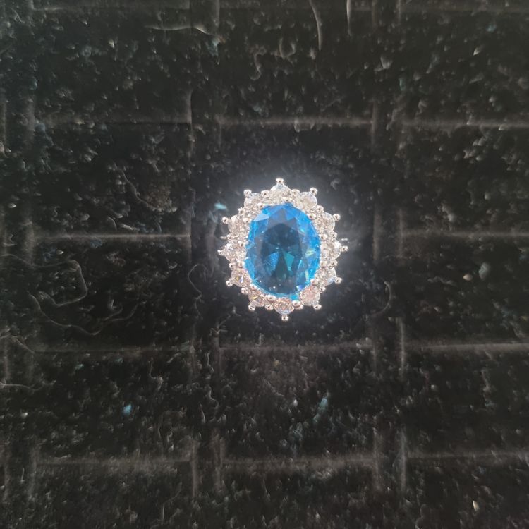 Silver Ring With Blue Gemstone And Clear Stones