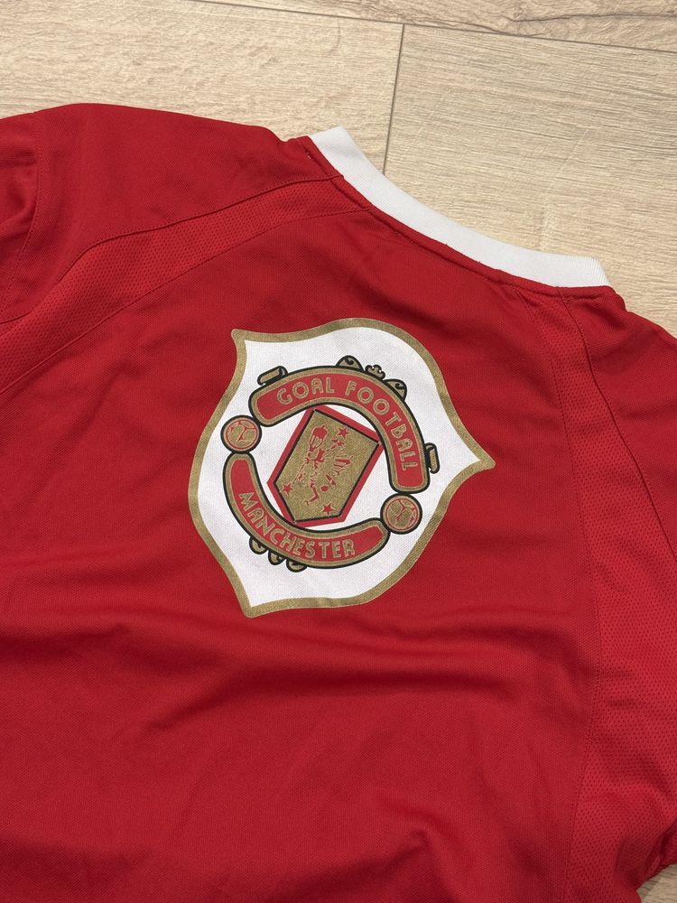 red football shirt with white collar and gold piping 2