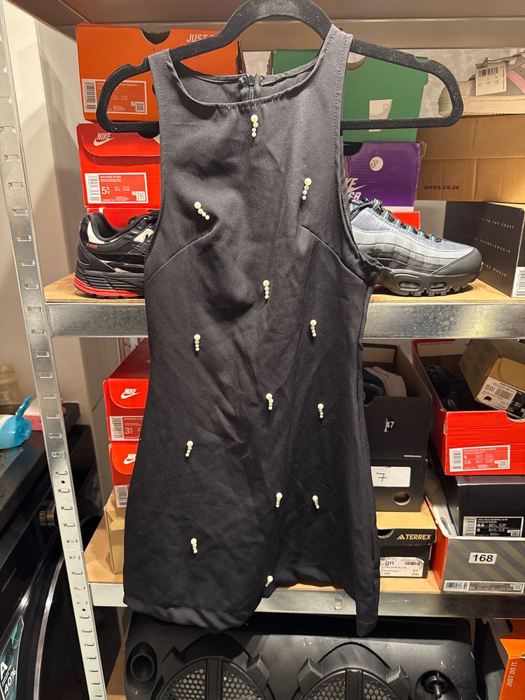 Black Sleeveless Dress With Pearl Embellishments