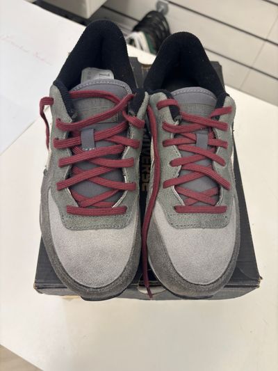 Grey And Black Sneakers With Red Laces
