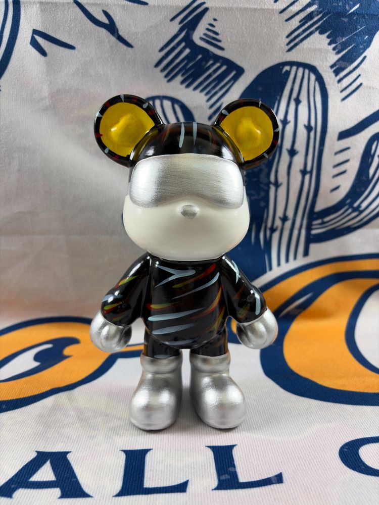 Black And Silver Bear Figurine With Yellow Ears