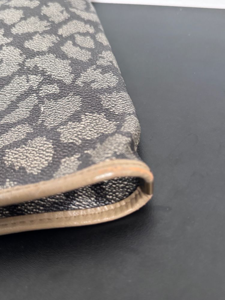 Yves Saint Laurent patterned pouch bag 7