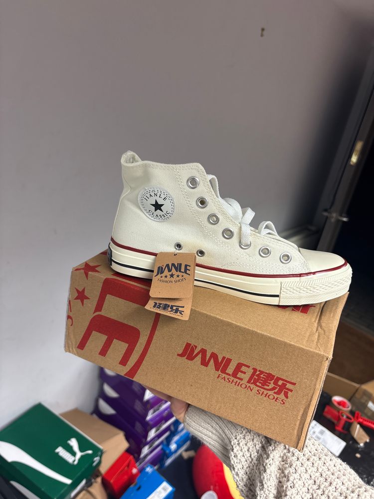 Jainle high tops white with red line 