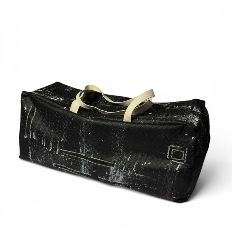 Black Woven Duffle Bag With White Paint Splatter Design image 1