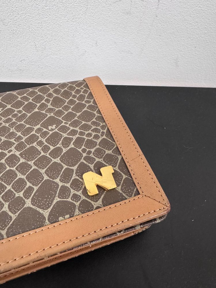 Nina Ricci patterned clutch bag 4