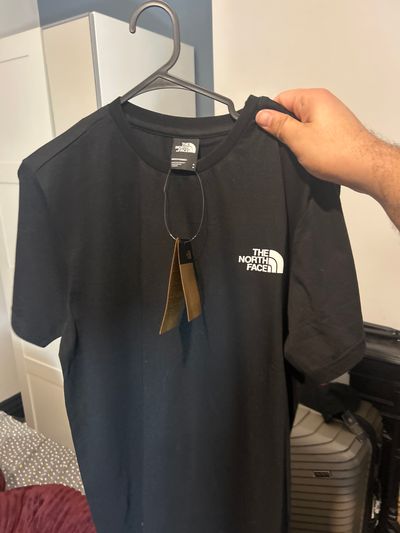 The North Face red box tee