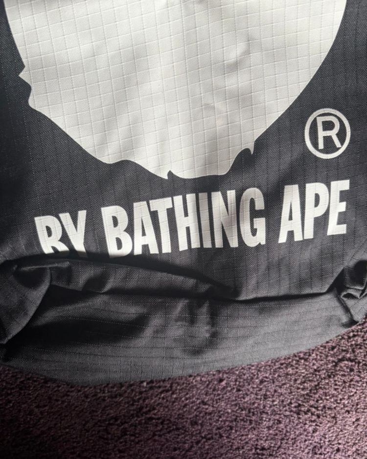 Black Backpack With White Ape Face Logo And Text image 3