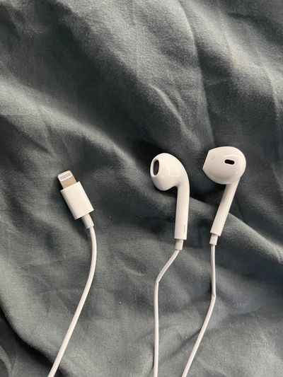 White Wired Earphones With Lightning Connector
