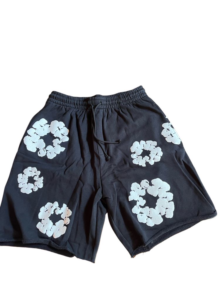 Denim Tears black shorts with white floral print