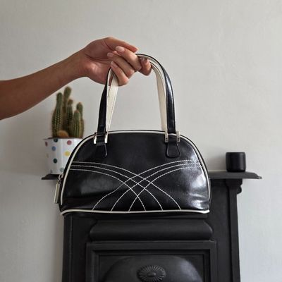 y2k black sporty style mini handbag with white stitching and handles