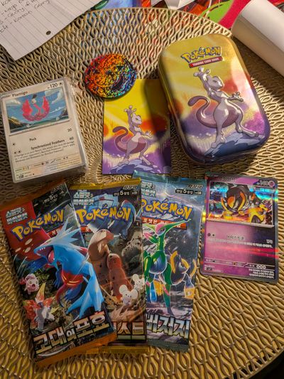 Pokémon Tin bundle picture is an example