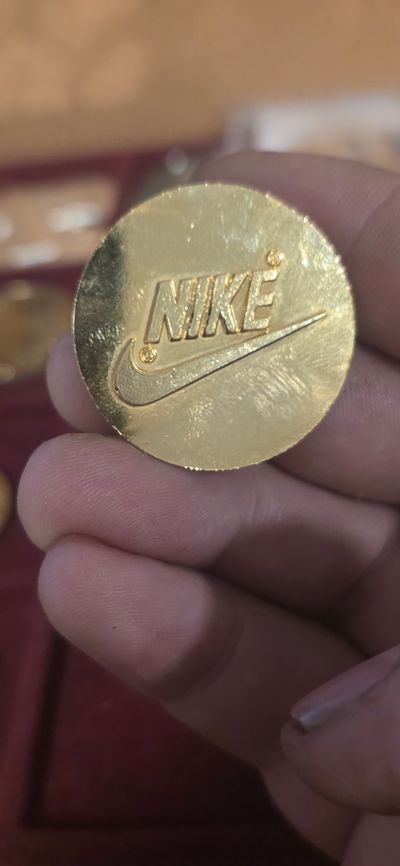 Nike Gold Coin view all pictures £7