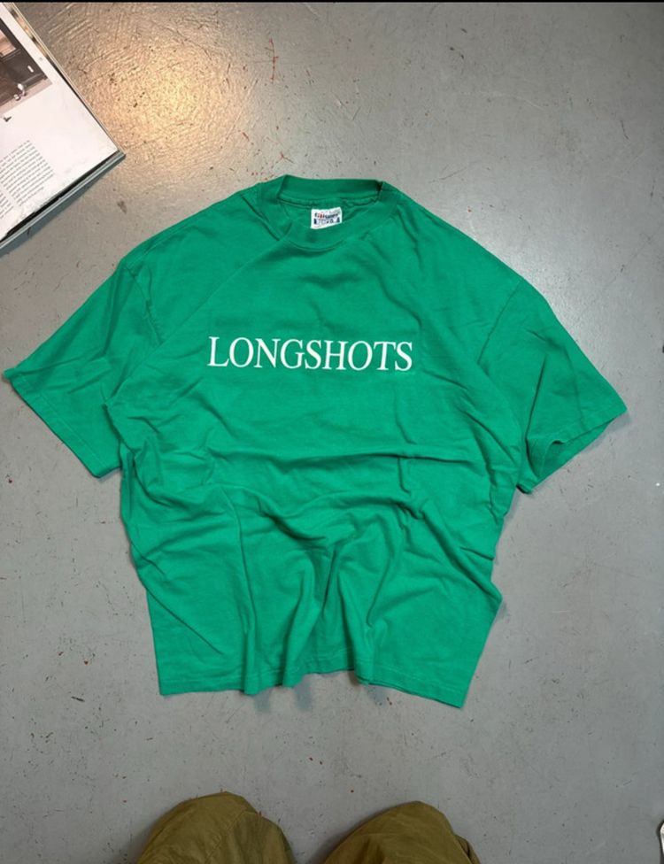 Green T-Shirt With Longshots Text