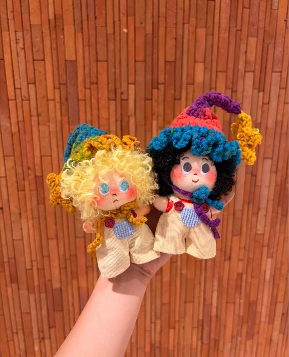 Two Colorful Clown Dolls