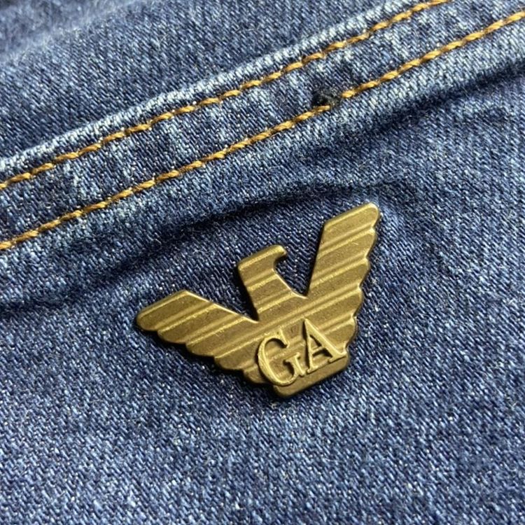 Armani Armani Jeans in a nice dark blue wash, featuring a metal eagle embossed on the back pocket and Arman product image