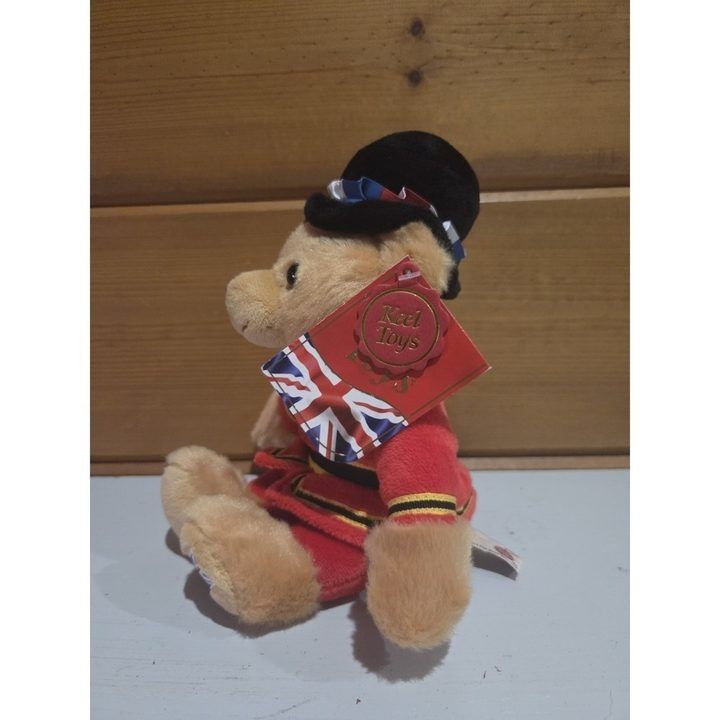 Red Dressed Teddy Bear With Black Hat obraz 1
