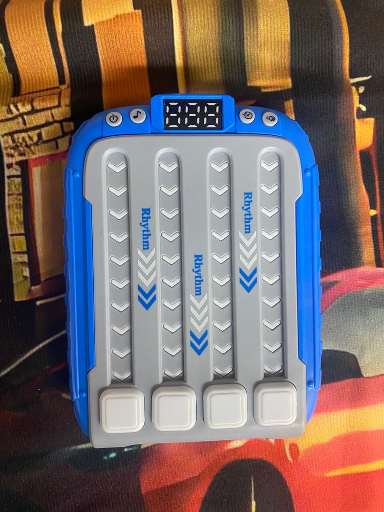 Blue And Gray Electronic Device With Buttons image 1