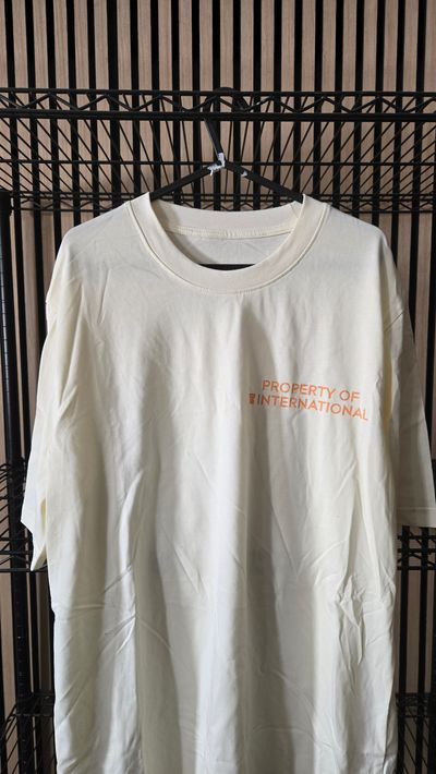 B129 DJK International Property Tee Brand New
