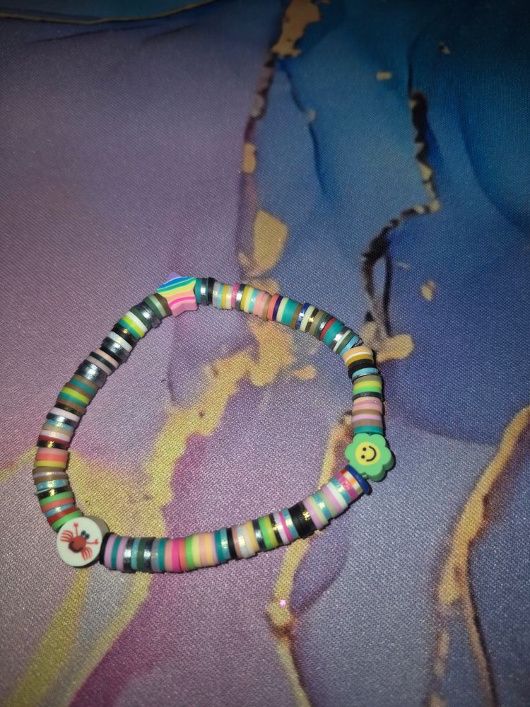 Unknown Colorful Beaded Bracelet with Flower and Ladybug Charms product image