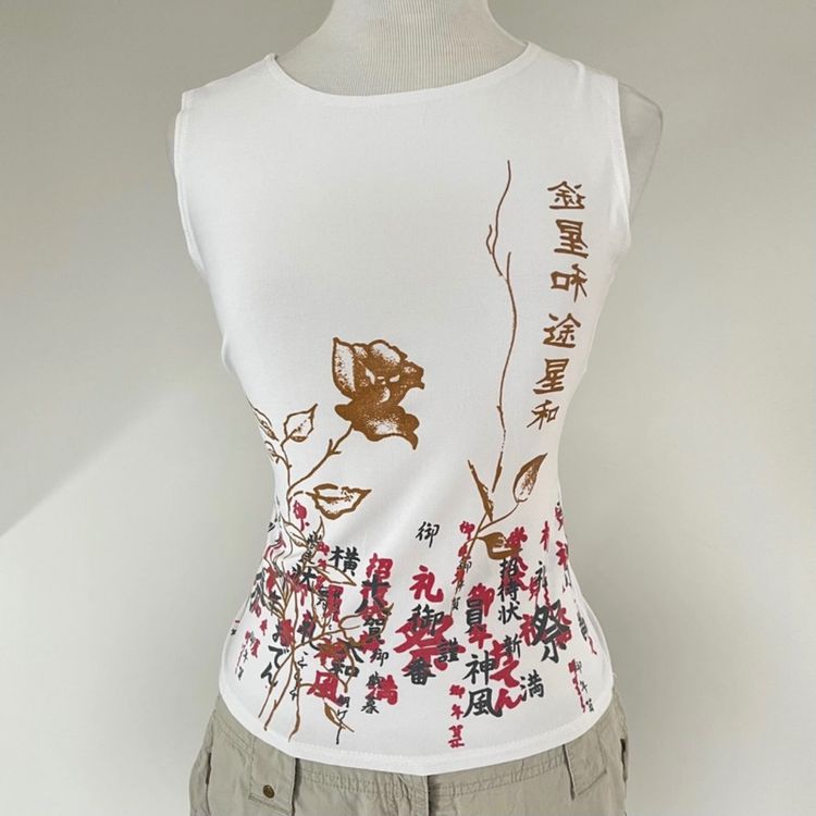 White Sleeveless Top With Floral And Script Print image 2