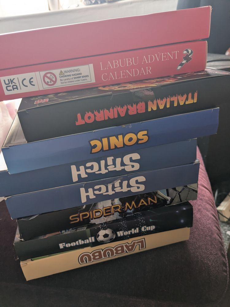 Stack Of Assorted Boxed Toys And Games