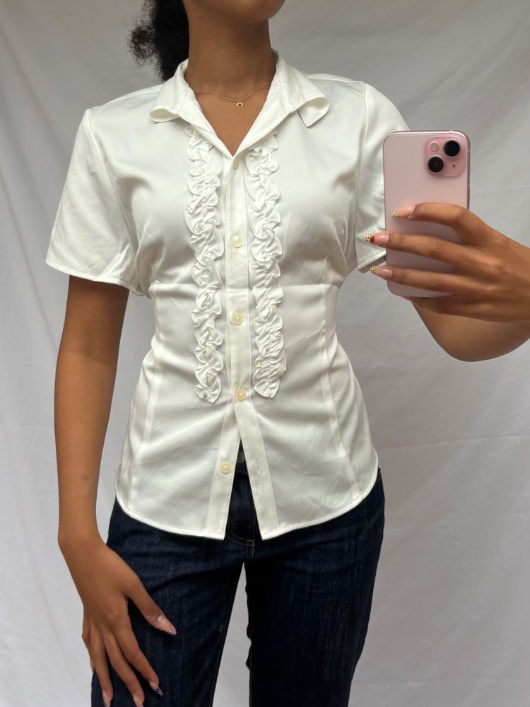 white short sleeve blouse with ruffle detail
