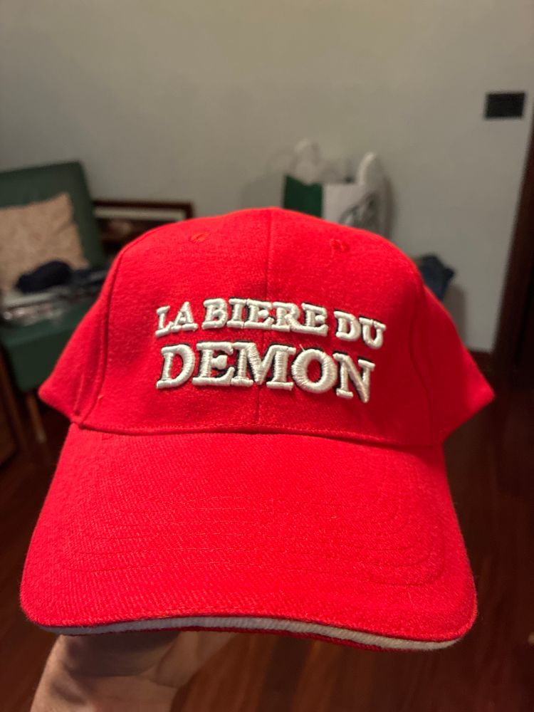 Red Baseball Cap With Embroidered Text
