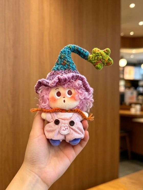 Immagine di Crocheted Doll With Colorful Hat 6
