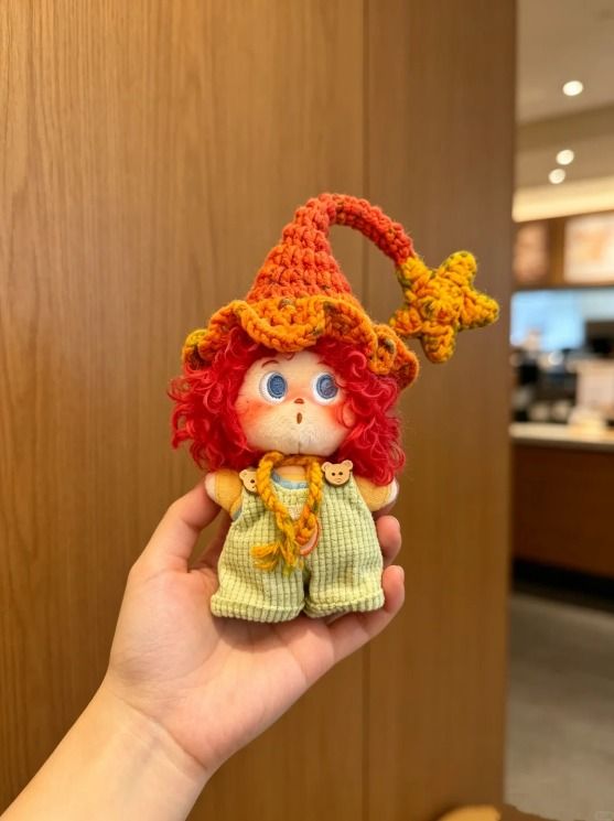 Immagine di Crocheted Doll With Colorful Hat 2