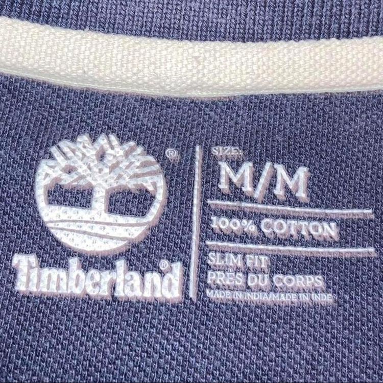 Vintage timberland navy blue washed out coloured polo shirt with small embroidered timberland logo 3