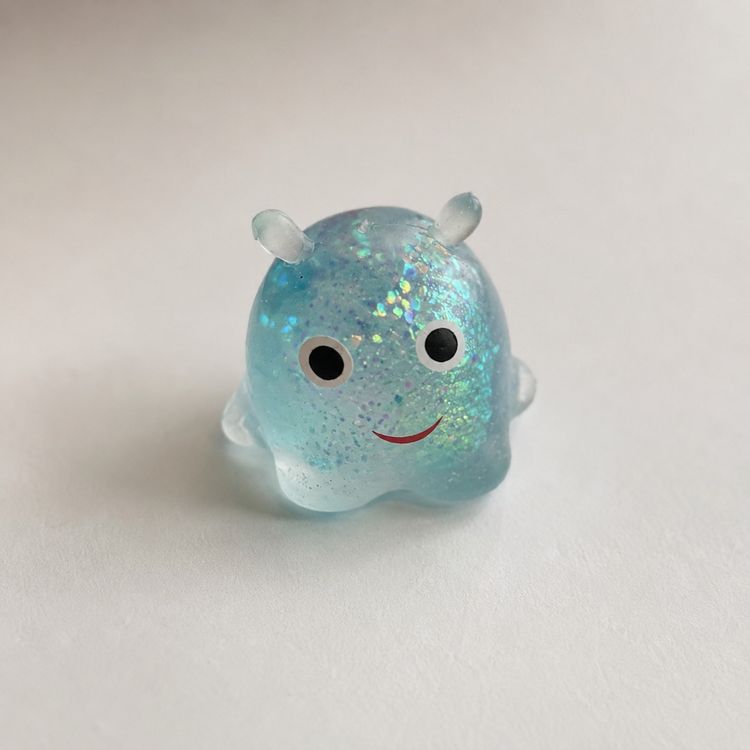 Octopus squishy sugar filled with blue glitter inside