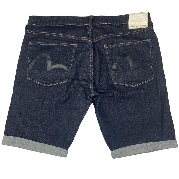 Evisu Evisu Denim shorts in a dark blue wash, with the iconic gulls on both back pockets, and a white Evis product image