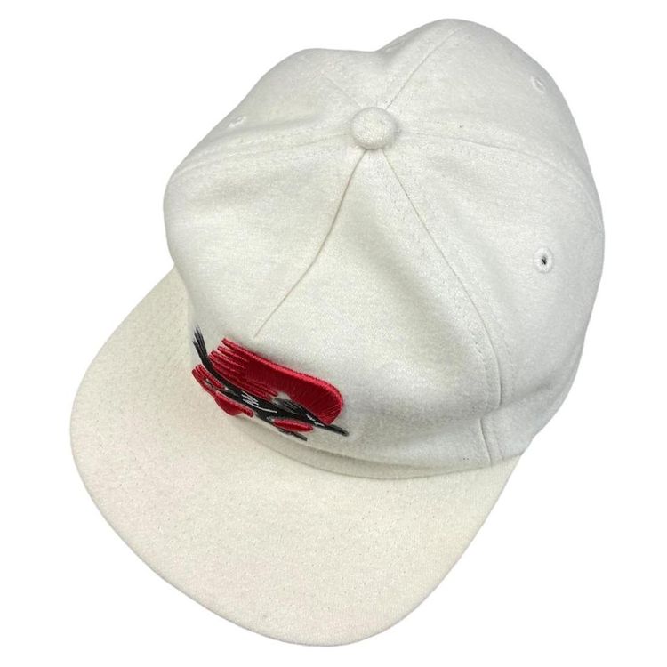 Palace Palace Roadrunner Cap, creme in colour, with a red P and black roadrunner graphic over the top, both product image