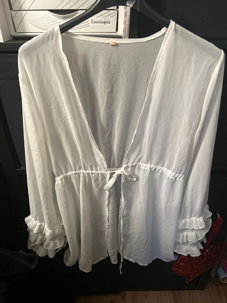 white long sleeve blouse with ruffle cuffs image 1