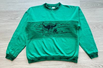 Green Sweatshirt With Skier Graphic