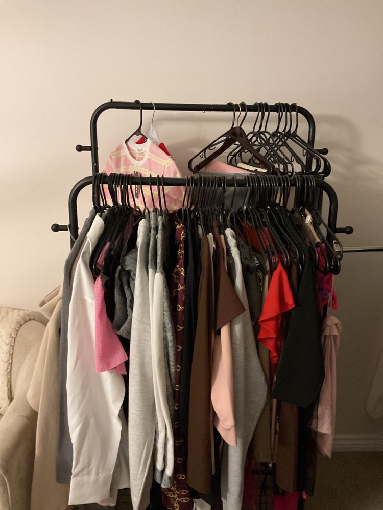 On Running Assorted Women'S Clothing On Hangers product image
