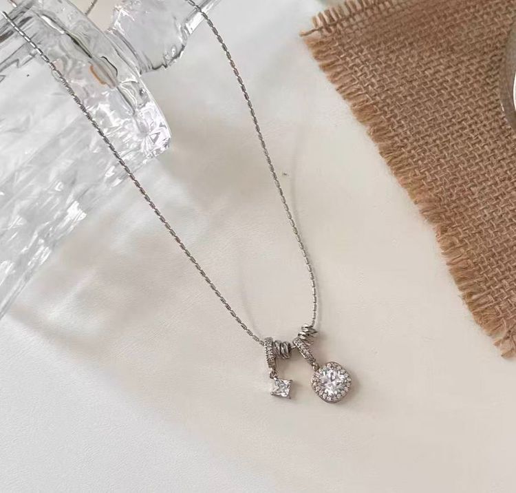 Silver Necklace With Two Pendants image 1