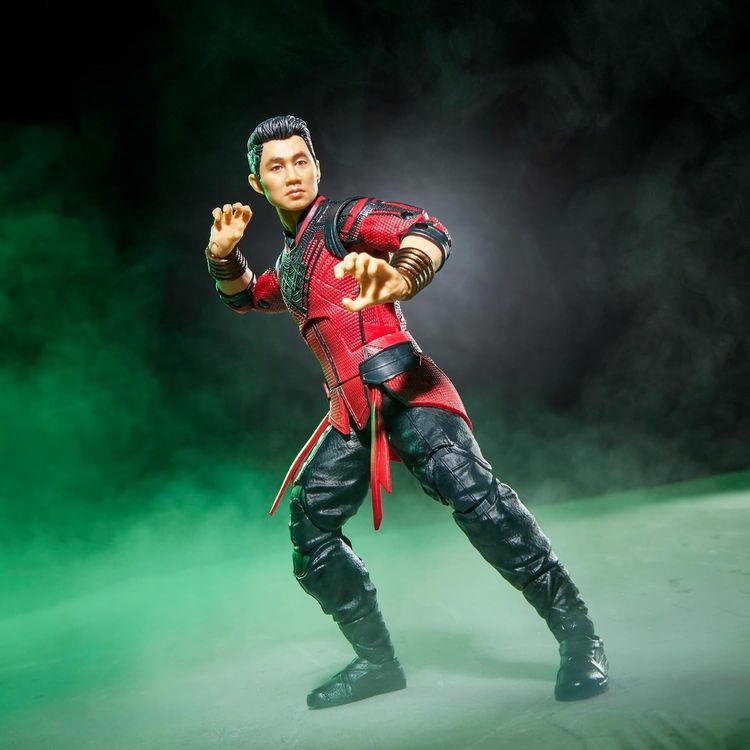 Action Figure With Red And Black Outfit And Yellow Flame Accessories 3