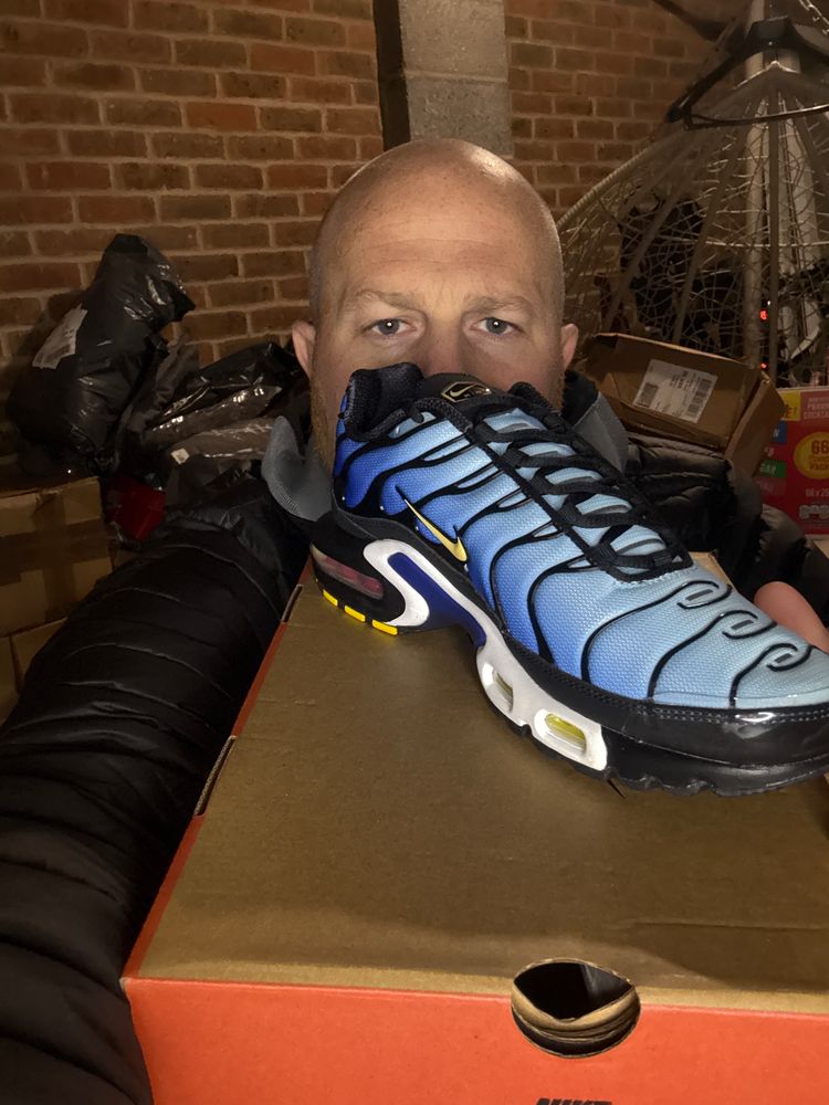 Nike blue and black athletic sneakers product image