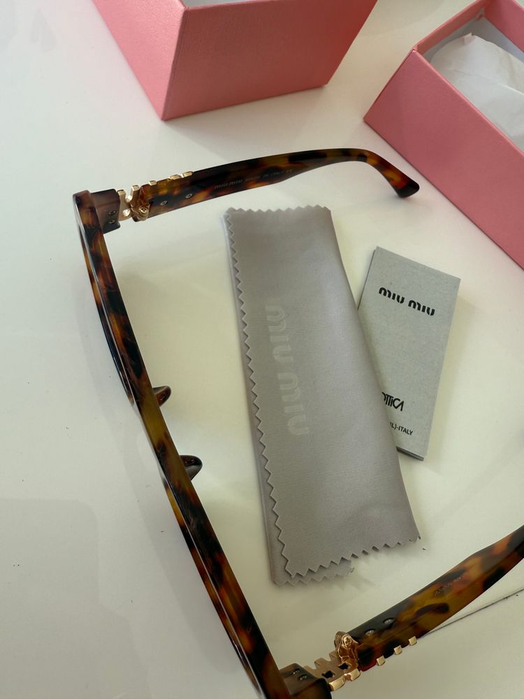 Miu Miu Tortoiseshell Sunglasses 8