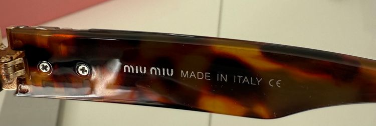 Miu Miu Tortoiseshell Sunglasses 5