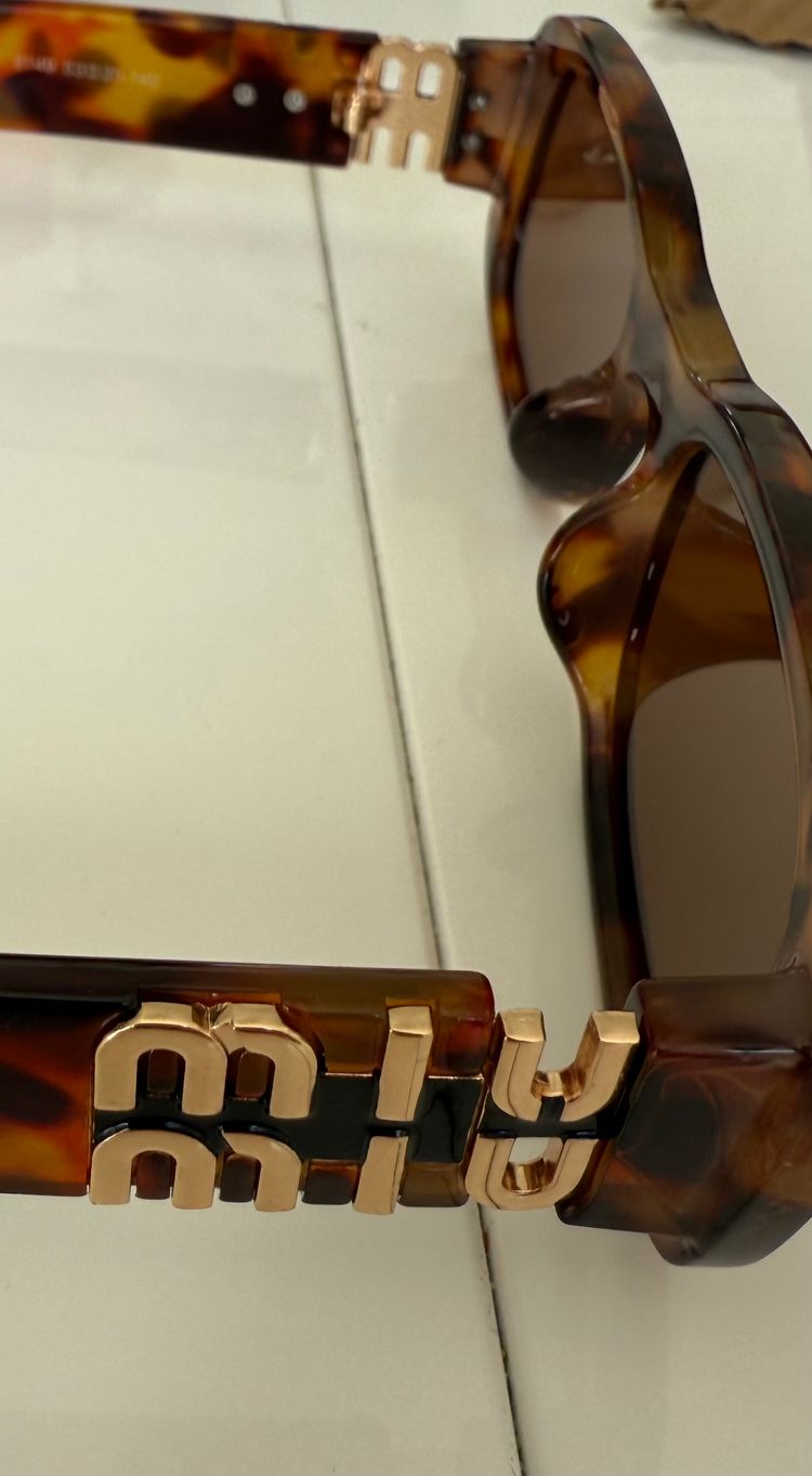 Miu Miu Tortoiseshell Sunglasses 3