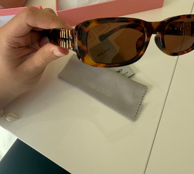 Miu Miu Tortoiseshell Sunglasses 9