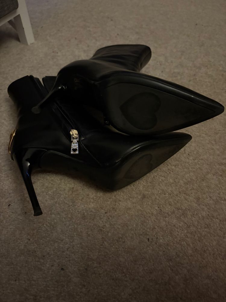 Black pointed toe stiletto ankle boots with gold heart detail 2