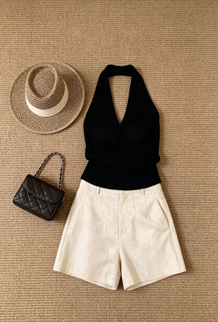 Equipment Black Halter Top And Beige Shorts Outfit With Straw Hat And Black Quilted Handbag product image